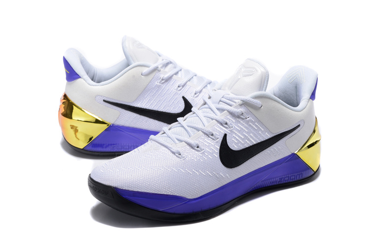 purple and white nike basketball shoes